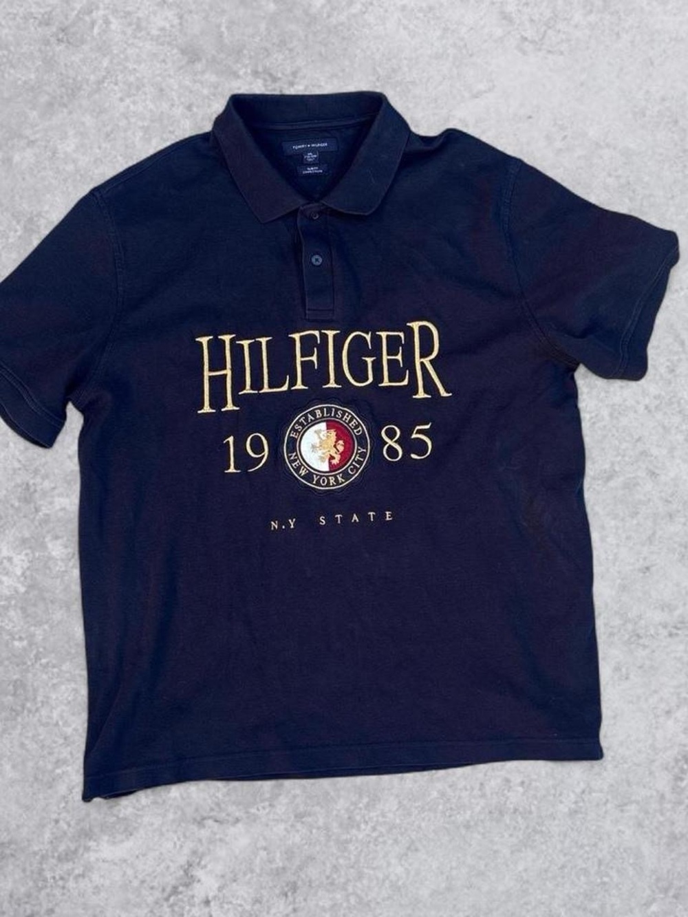 Tommy Hilfiger Black Polo with Gold Crest and Lettering